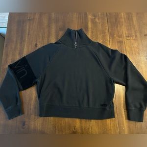 Calvin Klein turtle neck sweater, with half zipper.